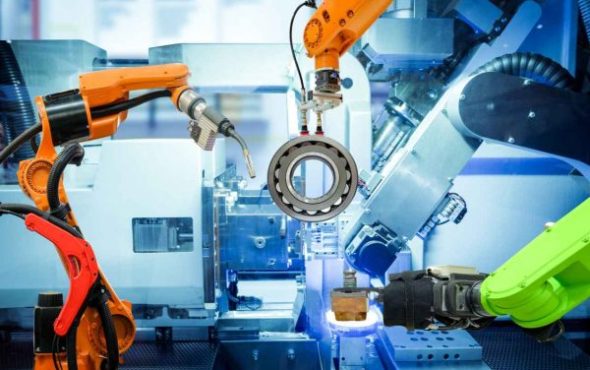 stock-photo-industrial-robotic-welding-and-robot-gripping-working-on-smart-factory-on-machine-blue-tone-color-1015116082-600x400